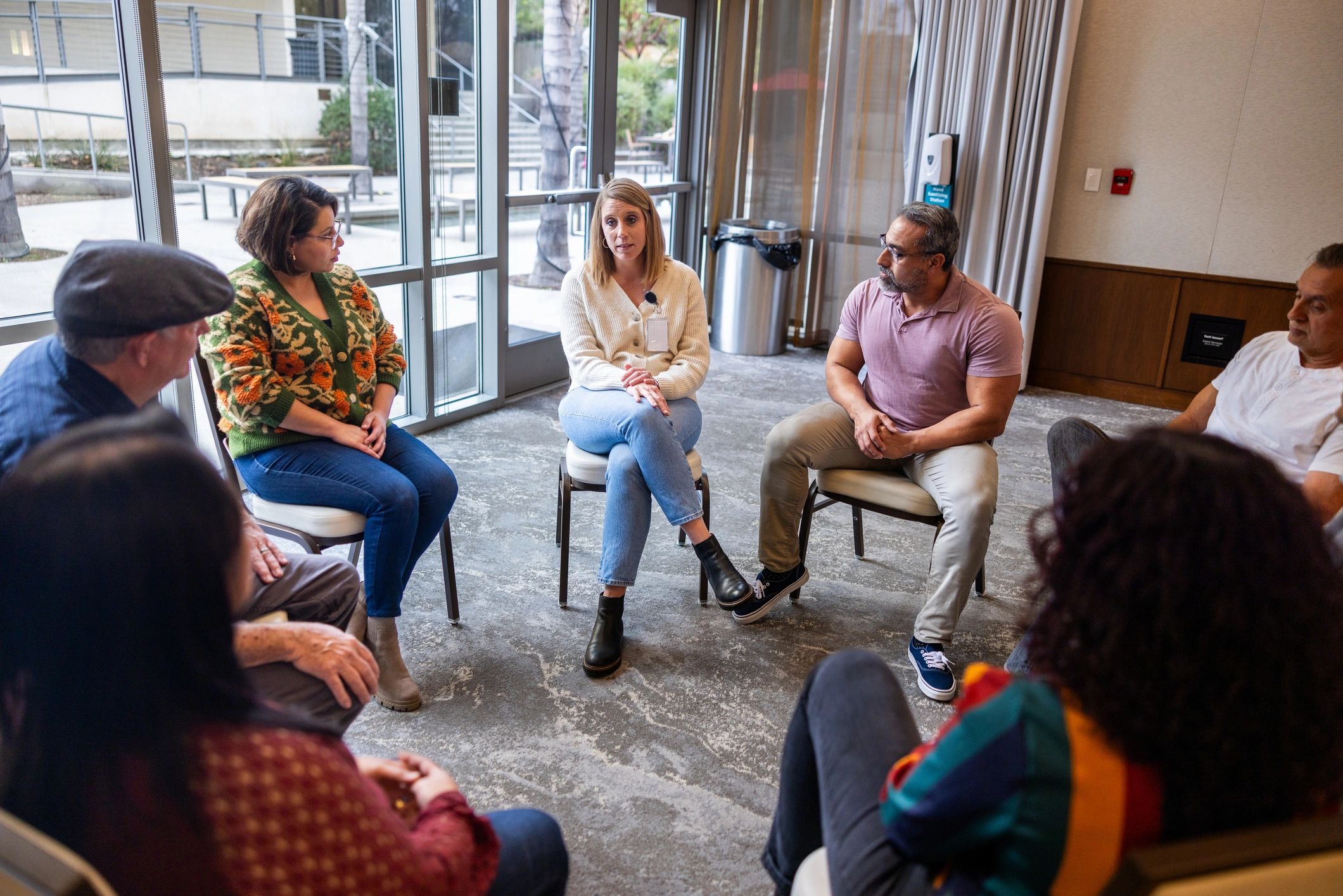 Support group gathered in a welcoming community meeting space